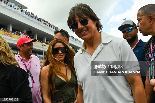 Actor Tom Cruise and Colombian singer Shakira attend the 2023 Miami Formula One Grand Prix at the Miami International Autodrome in Miami Gardens,...