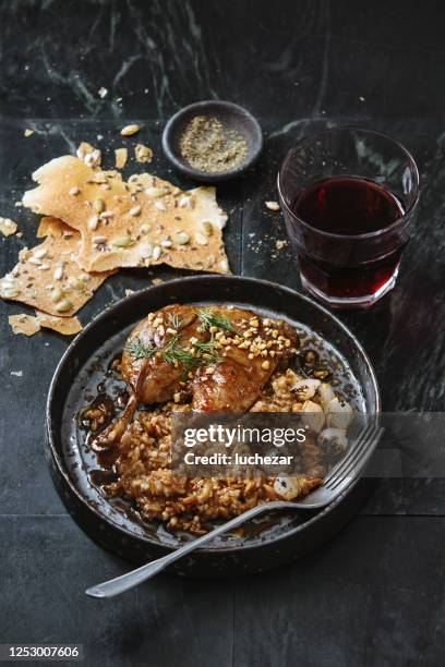 traditional danish slow cooker duck leg confit - confit stock pictures, royalty-free photos & images