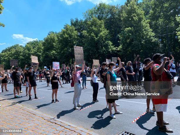Protesters participate in a rally to show solidarity with the Black Lives Matter movement on June 27, 2020 in Berlin, Germany.