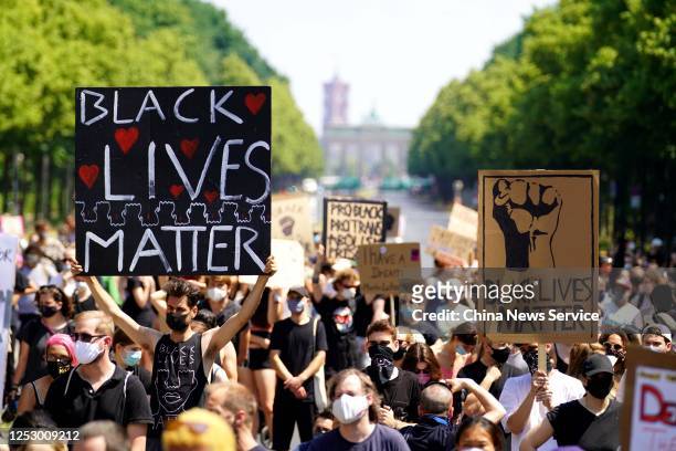 Protesters participate in a rally to show solidarity with the Black Lives Matter movement on June 27, 2020 in Berlin, Germany.