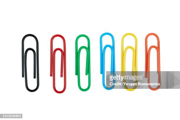 colourful paper clips isolated on white background - black and white fotografías e imágenes de stock