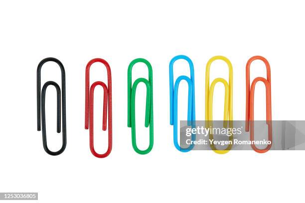 colourful paper clips isolated on white background - paperclip imagens e fotografias de stock