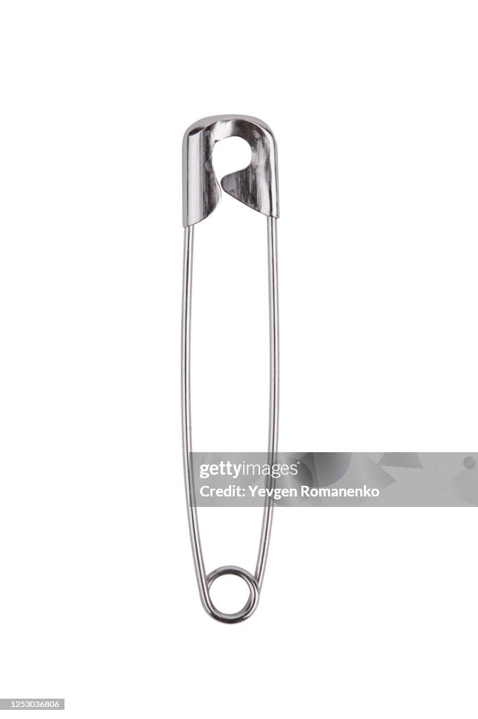 Safety pin isolated on white background