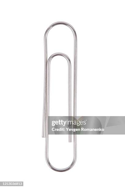 paper clip on a white background - nietje stockfoto's en -beelden