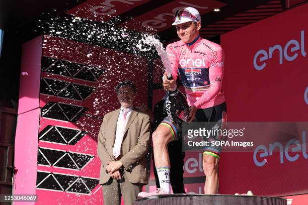 Remco Evenepoel of Belgium and Team Soudal - Quick Step on podium celebrates the victory of the Pink Leader Jersey during the Stage 2 of the 106th...