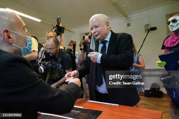 Jaroslaw Kaczynski, leader of the social conservative Law and Justice party, arrives to cast his ballot in the Polish presidential election during...