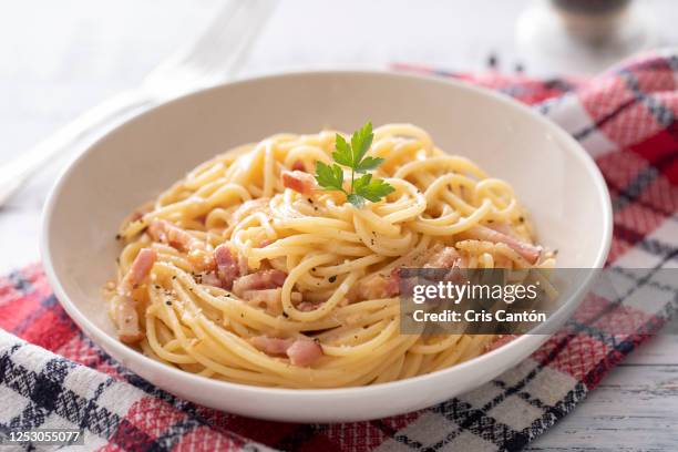 spaghetti carbonara - creme eggs stock pictures, royalty-free photos & images