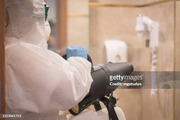 disinfection process covid 19 - decontamination stock pictures, royalty-free photos & images