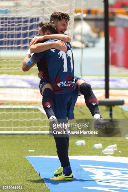Jose Luis Morales of Levante UD celebrates with Enis Bardhi after scoring his team's third goal during the La Liga match between Levante UD and Real...