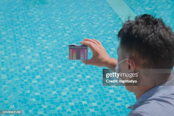 pool water testing - swimming pool maintenance stock pictures, royalty-free photos & images