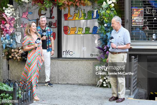 American journalists, Ken Rosato, Lauren Glassberg and United States Senator Chuck Schumer speak during the 50th anniversary of the first Pride march...