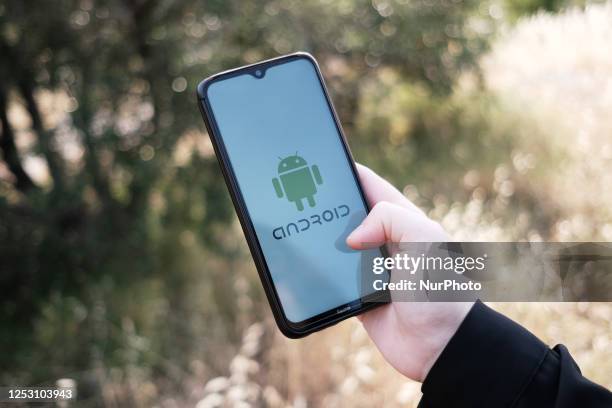 In this photo illustration an Android logo seen displayed on a smartphone screen in Athens, Greece on May 7, 2023.