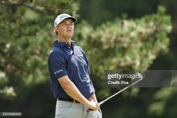 Patton Kizzire of the United States reacts to his shot from the fifth tee during the final round of the Travelers Championship at TPC River Highlands...
