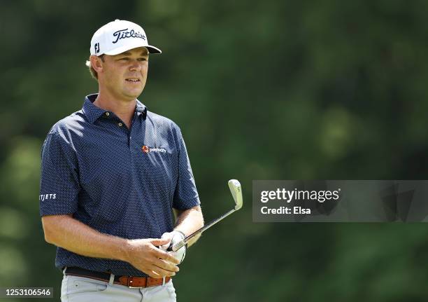 Patton Kizzire of the United States reacts to his shot from the fifth tee during the final round of the Travelers Championship at TPC River Highlands...