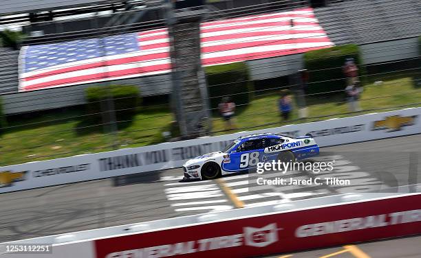 Chase Briscoe, driver of the Highpoint.com Ford, crosses the finish line to win the NASCAR Xfinity Series Pocono Green 225 Recycled by J.P. Mascaro &...