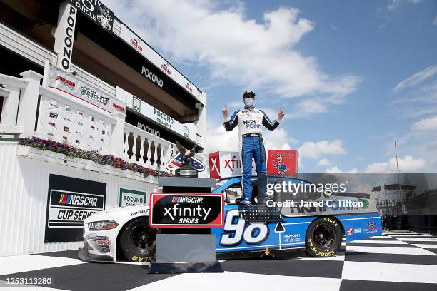 Chase Briscoe, driver of the Highpoint.com Ford, celebrates in Victory Lane after winning the NASCAR Xfinity Series Pocono Green 225 Recycled by J.P....