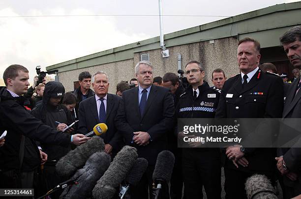 Peter Hain, MP for Neath, Welsh first minister Carwyn Jones, Peter Vaughan, Chief Constable of South Wales Police and Richard Smith, from mid and...
