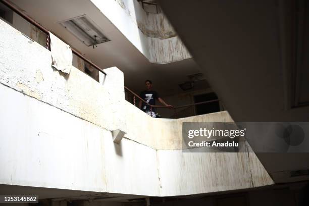 Migrants, living in risky hotel, are seen as authorities notify them to evacuate the hotel in Ciudad Juarez on Mexico on April 20, 2023. Civil...