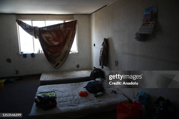 Migrants, living in risky hotel, are seen as authorities notify them to evacuate the hotel in Ciudad Juarez on Mexico on April 20, 2023. Civil...