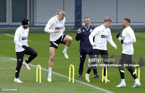 Manchester City's Ilkay Gundogan, Erling Haaland, Kevin De Bruyne and Kyle Walker during a training session at the City Football Academy, Manchester....