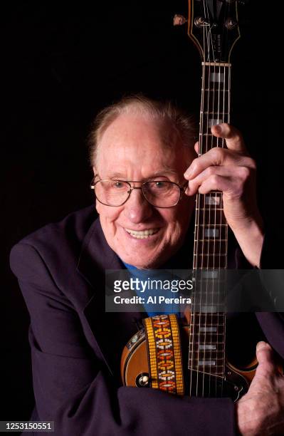 Les Paul appears in a portrait when he performs during Les Paul's 88th Birthday Celebration at Iridium Jazz Club on June 9, 2003 in New York City.