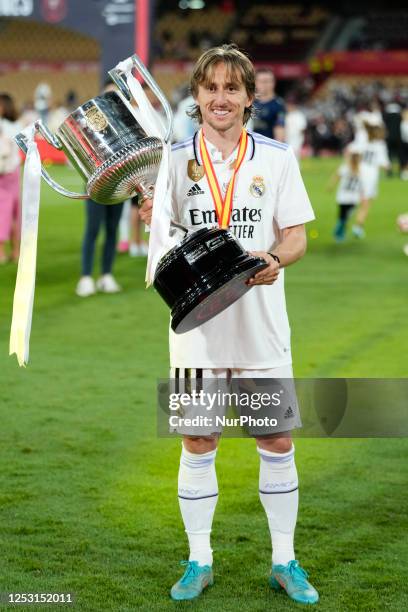 Luka Modric central midfield of Real Madrid and Croatia celebrates with the trophy after winning the Copa del Rey Final match between Real Madrid CF...