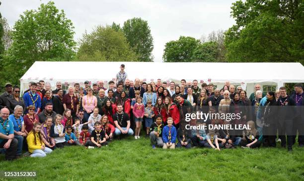 Standing in the middle, Britain's Catherine, Princess of Wales, Britain's Prince William, Prince of Wales, Britain's Prince George of Wales,...
