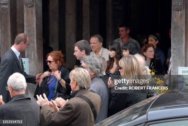 Nita Serrault , the widow of French actor Michel Serrault, followed by Gwendoline Courreges and Nathalie Serrault , grand-daughter and daughter of...