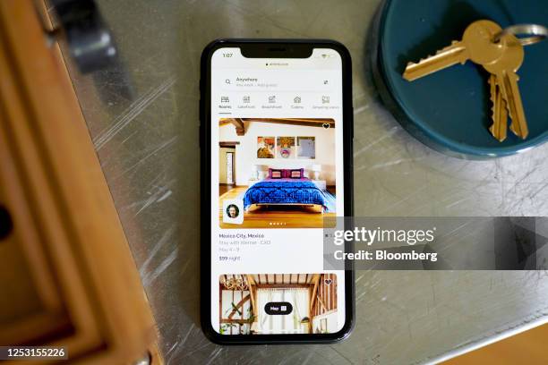 The Airbnb website on a smartphone arranged in the Brooklyn Borough of New York, US, on Friday, May 5, 2023. Airbnb Inc. Is scheduled to release...