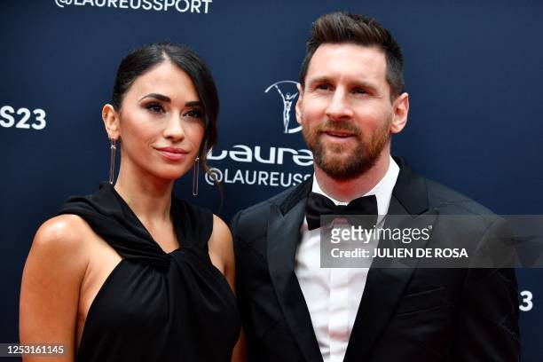 Laureus World Sportsman of the Year nominee Argentinian football player Lionel Messi and his wife Antonela Roccuzzo pose on the red carpet prior to...