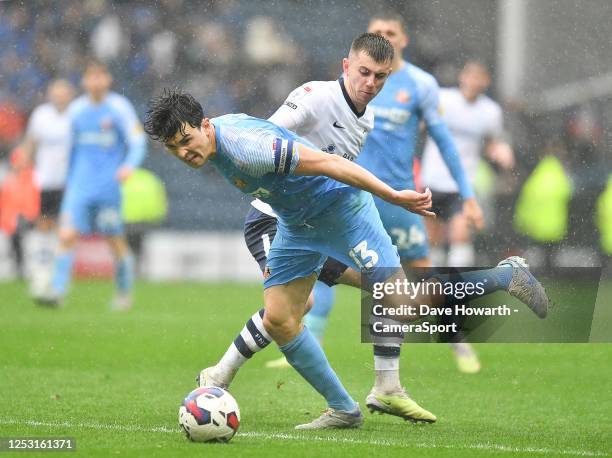 Preston North End's Ben Woodburn battles with Sunderland's Luke O'Nien during the Sky Bet Championship between Preston North End and Sunderland at...