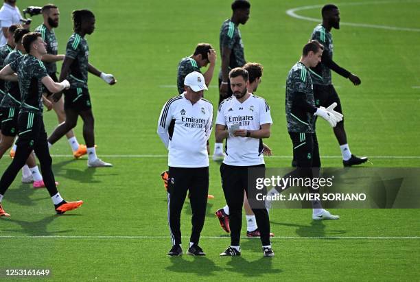 Real Madrid's Italian coach Carlo Ancelotti and Real Madrid's Italian assistant coach Davide Ancelotti lead a training session on the eve of their...