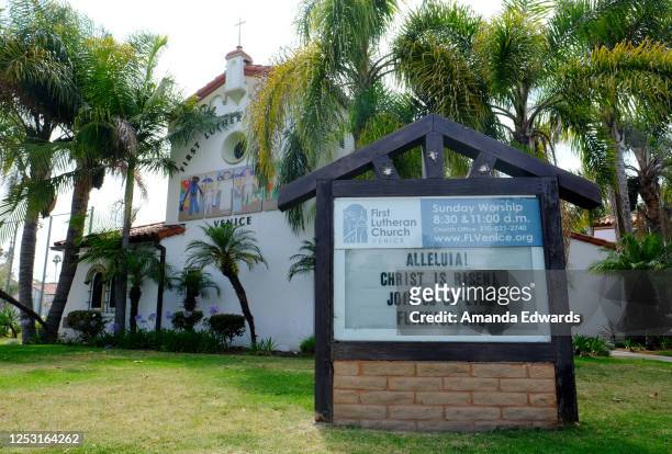 Sign announces online services outside a church on June 28, 2020 in Venice, California. Cities across the country are easing restrictions from the...
