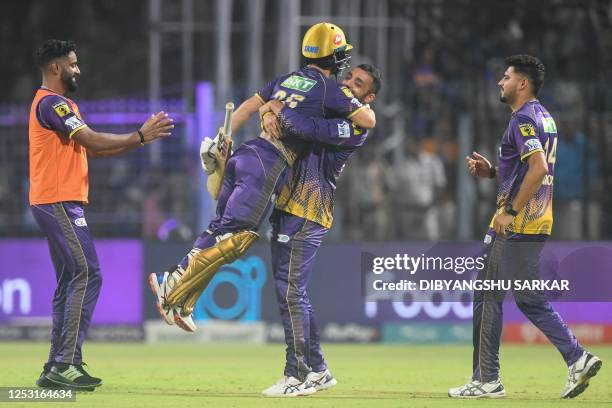 Kolkata Knight Riders' Rinku Singh celebrates with Varun Chakravarthy after winning the Indian Premier League Twenty20 cricket match between Kolkata...