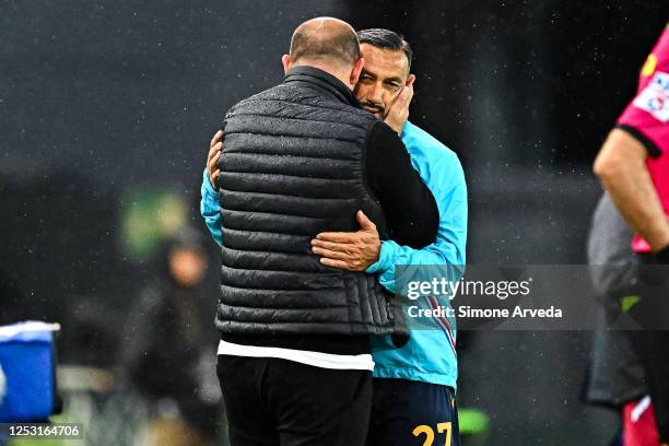 Dejan Stankovic head coach of Sampdoria greets Fabio Quagliarella as he leaves the pitch during the Serie A match between Udinese Calcio and UC...