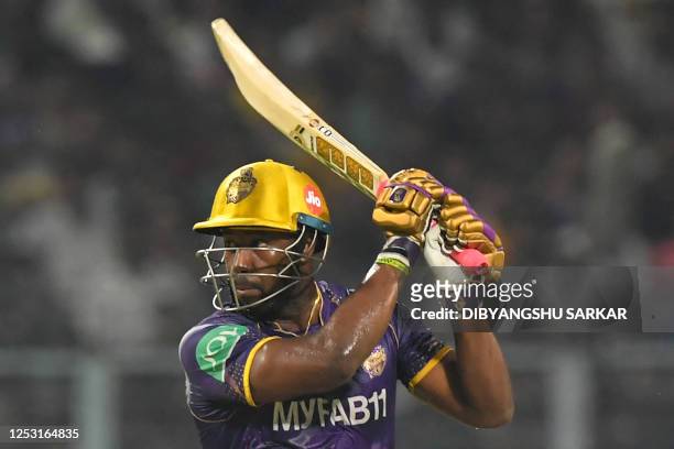 Kolkata Knight Riders' Andre Russell plays a shot during the Indian Premier League Twenty20 cricket match between Kolkata Knight Riders and Punjab...