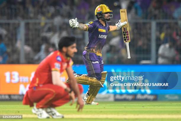 Kolkata Knight Riders' Rinku Singh celebrates after winning the Indian Premier League Twenty20 cricket match between Kolkata Knight Riders and Punjab...