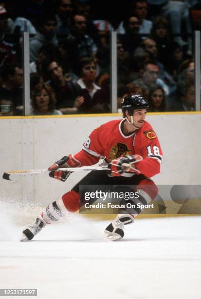 Denis Savard of the Chicago Blackhawks skates against the New Jersey Devils during an NHL Hockey game circa 1987 at the Brendan Byrne Arena in East...