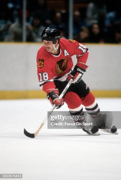 Denis Savard of the Chicago Blackhawks skates against the New Jersey Devils during an NHL Hockey game circa 1987 at the Brendan Byrne Arena in East...