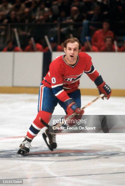 Guy Lafleur of the Montreal Canadiens skates against the New York Rangers during an NHL Hockey game circa 1979 at Madison Square Garden in the...