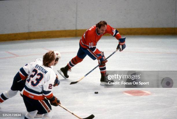 Guy Lafleur of the Montreal Canadiens skates against the New York Islanders during an NHL Hockey game circa 1984 at the Nassau Veterans Memorial...