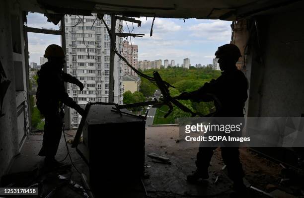 Rescuers seen in multi-storey residential building damaged by shrapnel from a downed kamikaze drone of the Russian army. On the night of May 8, the...