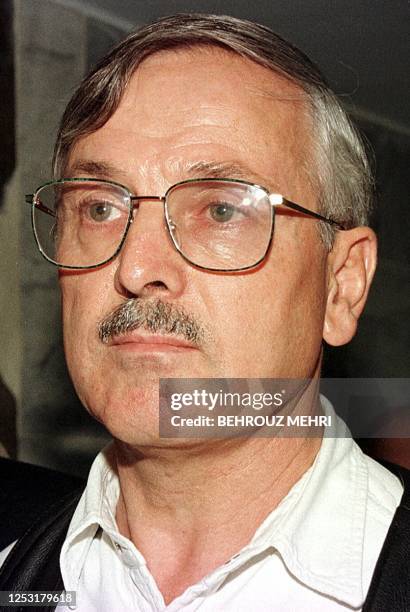 German businessman Helmut Hofer, sentenced to death in Iran for a relation with an Iranian Moslem woman, walks out from a Tehran court, 22 June 1999....