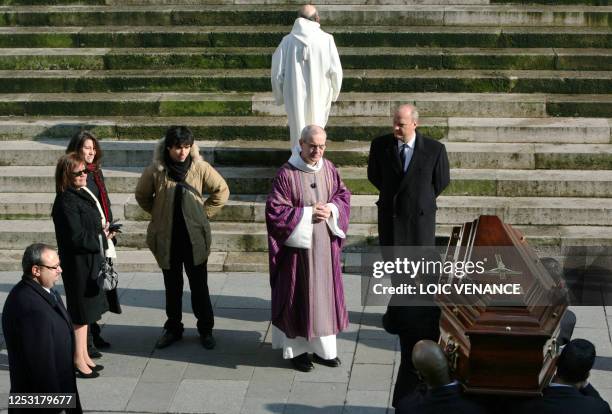 The coffin of French actress Annie Girardot is carried into Paris Saint-Roch church, on March 4 as her daughter Giulia Salvatori , his grandson...