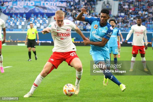 Daniil Denisov of Spartak and Mateo Cassierra Cabezas, commonly known as Mateo Cassierra of Zenit in action during the Russian Premier League...