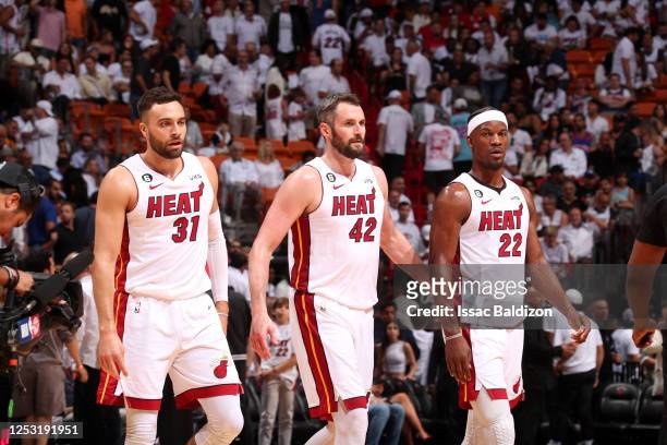Max Strus, Kevin Love and Jimmy Butler of the Miami Heat goes to the basket during Game 4 of the Eastern Conference Semi-Finals of the 2023 NBA...