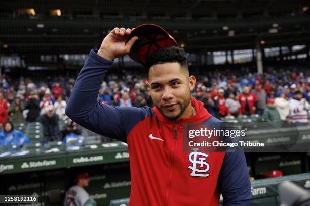 Cardinals catcher Willson Contreras watches the video board as the Cubs play a clip honoring their former catcher before the game Monday, May 8 at...