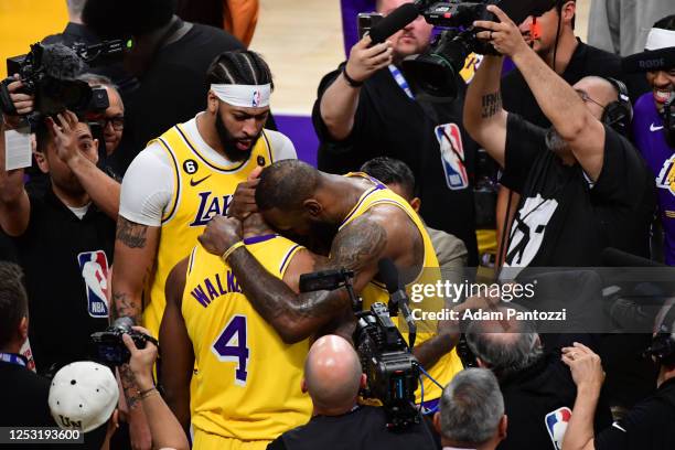 Lonnie Walker IV and LeBron James of the Los Angeles Lakers after Game Four of the Western Conference Semi-Finals of the 2023 NBA Playoffs against...