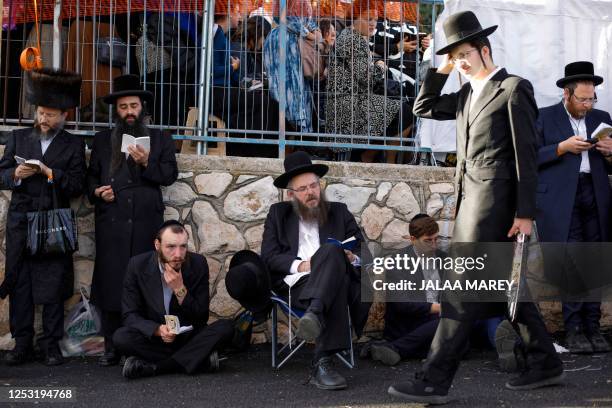 Ultra-Orthodox Jews pray at the gravesite of Rabbi Shimon Bar Yochai at Mount Meron in northern Israel on May 9 during the Jewish holiday of Lag...