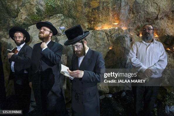 Orthodox Rabbiu Ultra-Orthodox Jews pray at the gravesite of Rabbi Shimon Bar Yochai ...